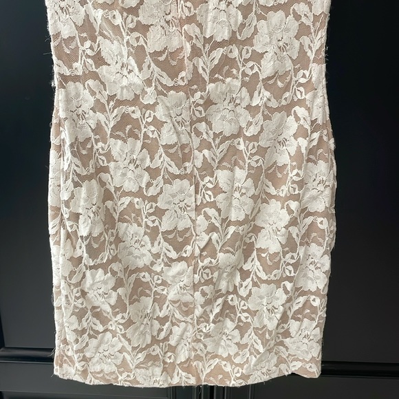 FLORAL MINI DRESS! NUDE COLOR AND WHITE FLORAL! Size: small! Racerback with zip! - Picture 8 of 12